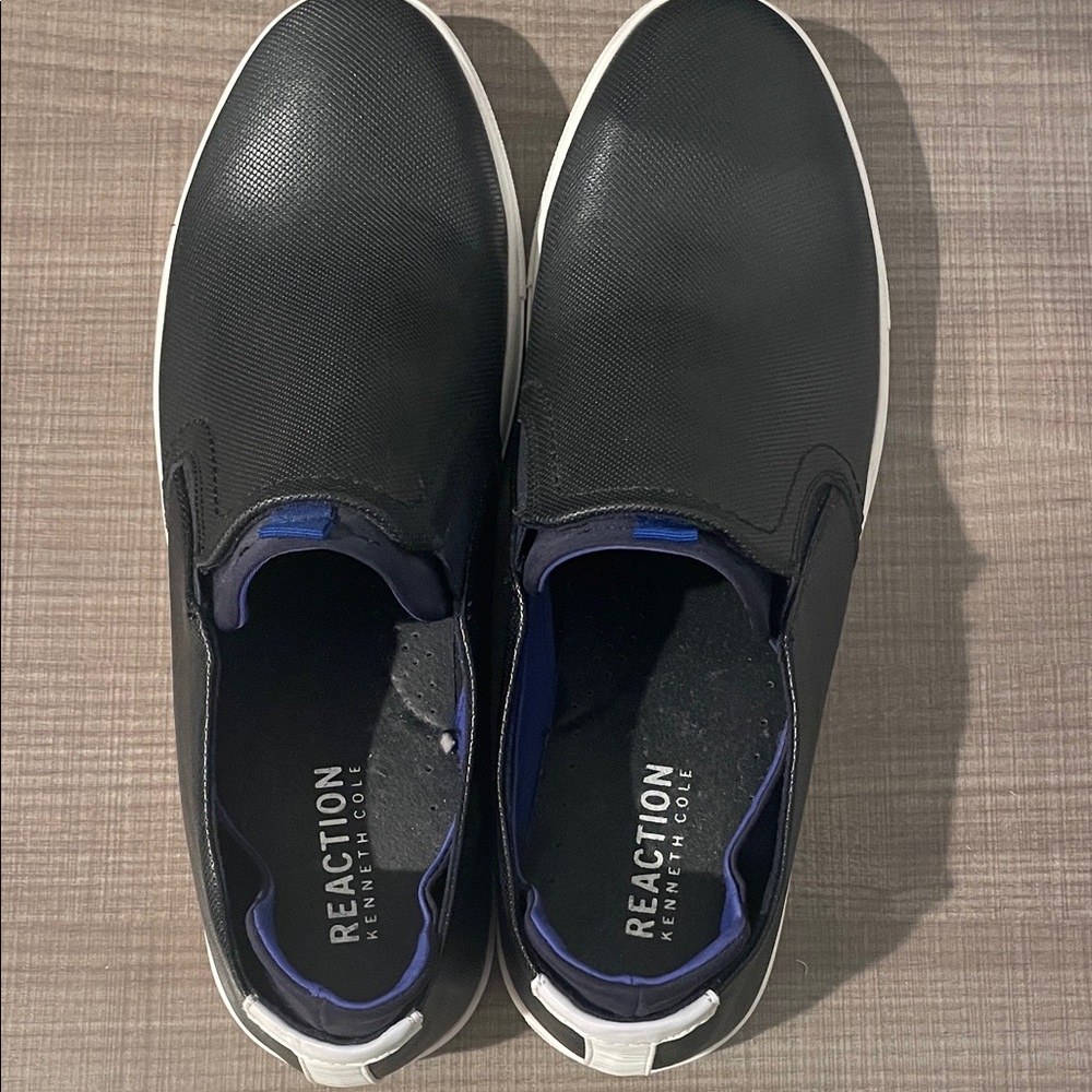 Kenneth Cole men’s Reaction Black and White Slip-On Loafers